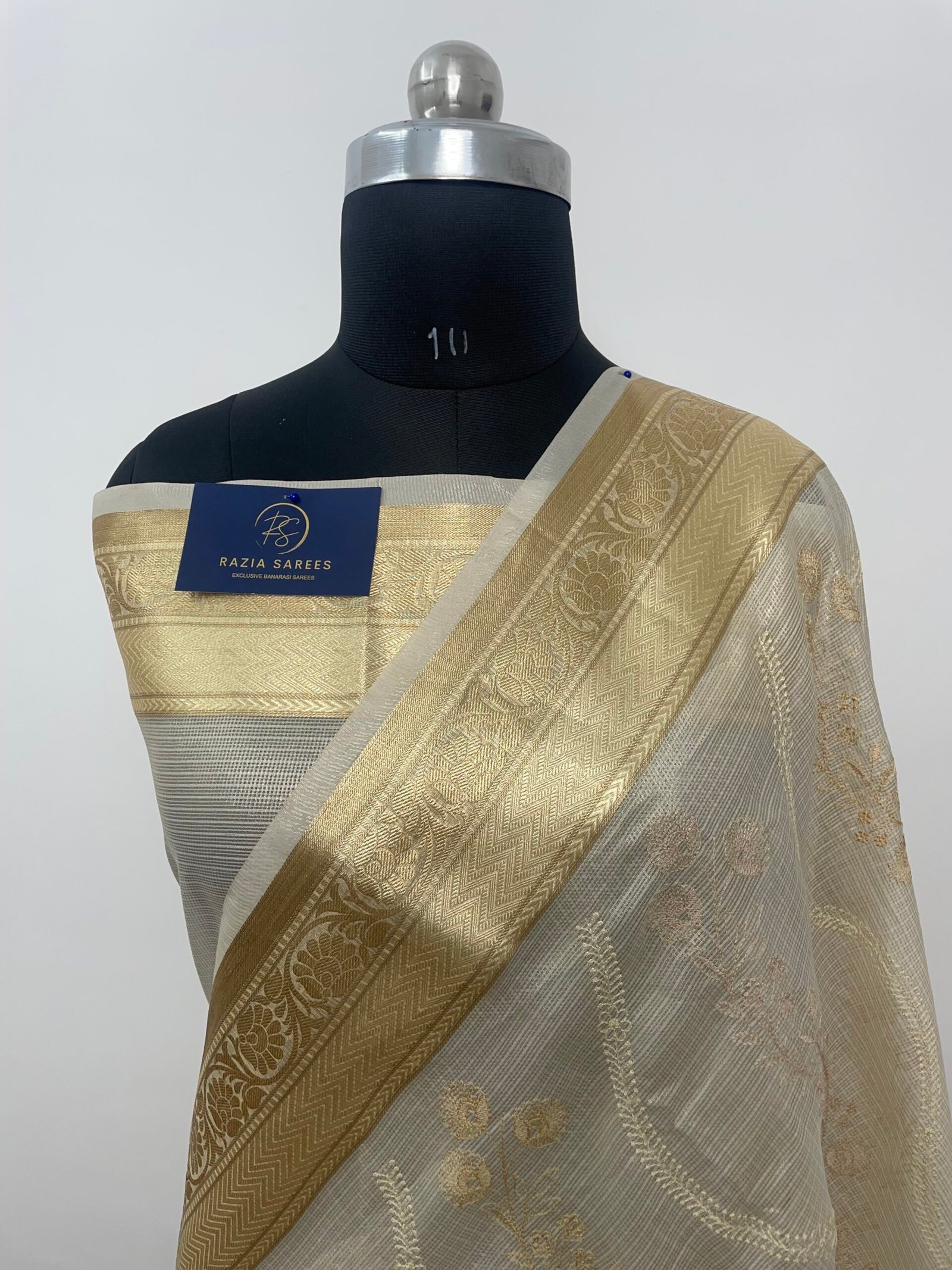 Cream Embroidery Tissue Silk Saree