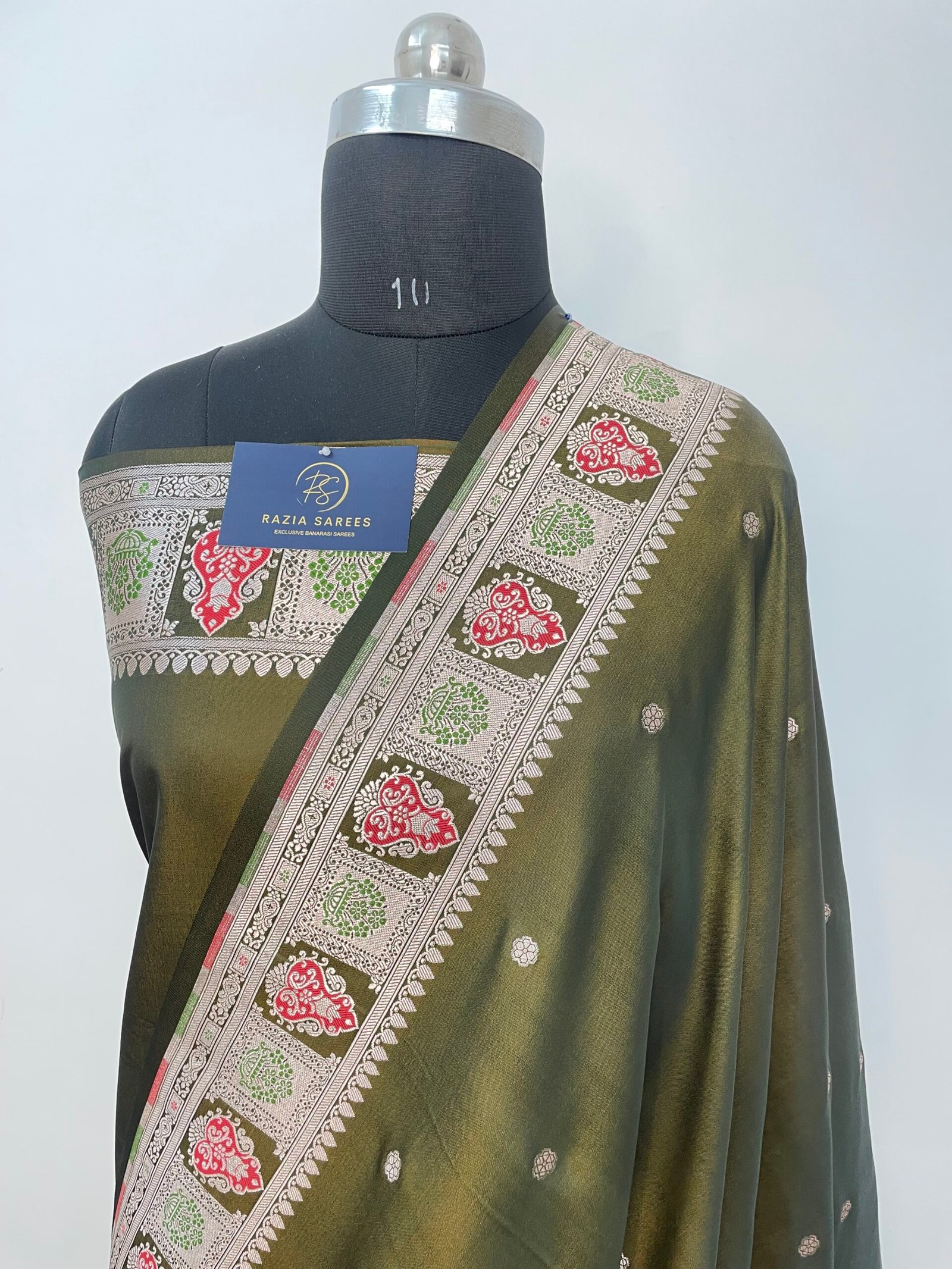 A. Pista Green Meenakari Booti Mashru Katan Silk Saree